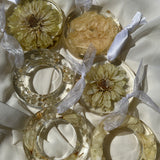 Set of six handcrafted resin Christmas ornaments with preserved flowers, designed by Happihome for elegant holiday décor.